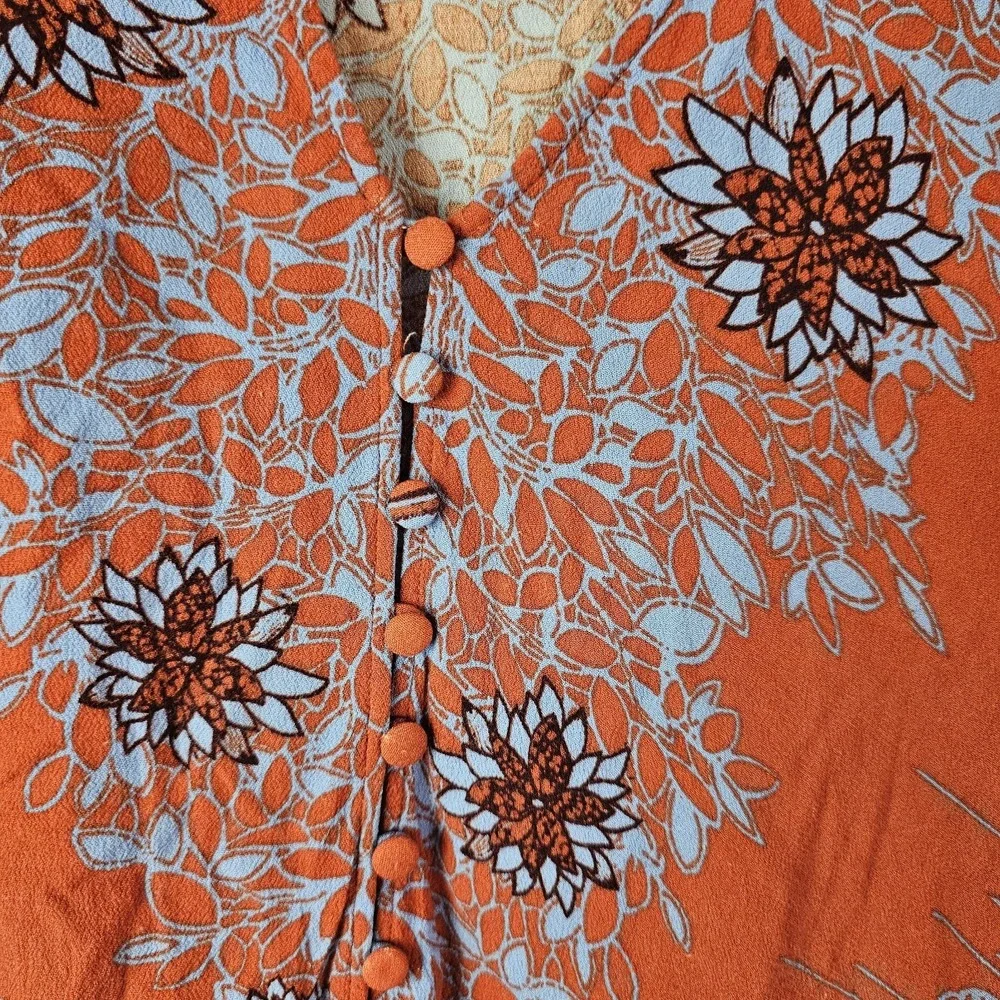 Free People Pumpkin Orange Blue Birds of a Feather Top Blouse L Oversized Boho